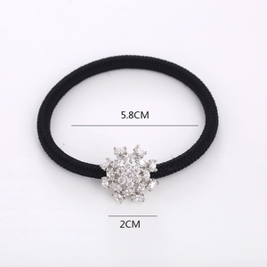 Sparkling snowflake hair tie with premium zircon stones on a black elastic band