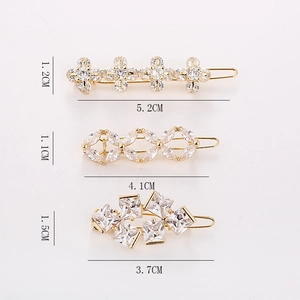 Lot de 3 barrettes dorées avec trèfle en zircon et formes géométriques étincelantes