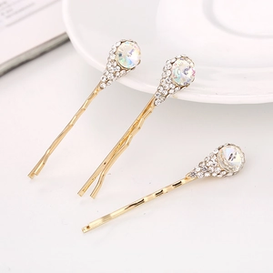 Lot de trois pinces à cheveux dorées avec fleurs en cristal et strass brillants