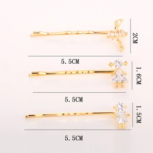 Set di tre fermagli per capelli dorati con cristalli zirconi e design di ballerina