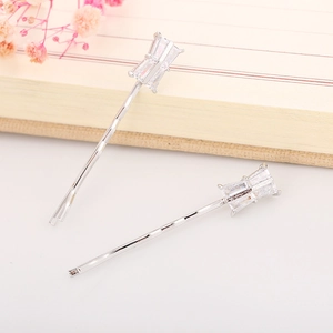 Detailed view of silver hair clips featuring sparkling rectangular zircon gemstones