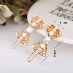 Barrette à cheveux élégante en alliage doré avec perles blanches et cristal strass central