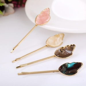 Set of four elegant acetate and alloy ice-cream style hair clips in pastel marble colors