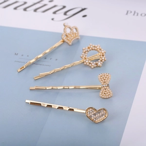 Elegant gold pearl hair clips set featuring crown, floral, bow and heart designs