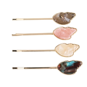 Set of four elegant acetate ice cream style hair clips with gold alloy metal finish