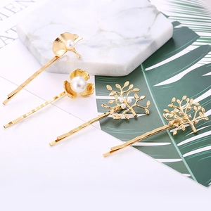 Élégant lot de 4 barrettes dorées avec feuilles de perles et motifs d'arbres en strass