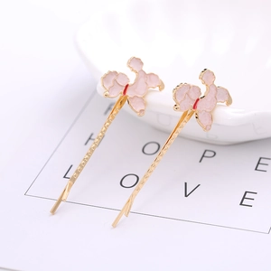 Golden poodle hair clips set with pink enamel finish for casual summer hair styling