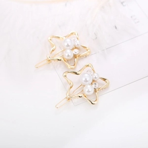 Star shaped gold hair clip with white pearls and small rhinestones for women