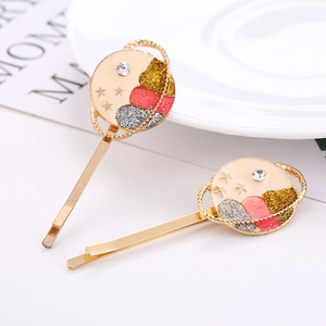 Coffret barrettes dorées astronaute et fleur avec émail scintillant et strass