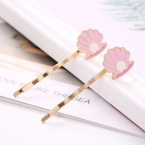 Barrettes coquillage rose avec perles et alliage doré pour un look marin estival chic