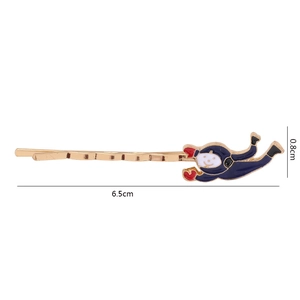 Vue détaillée d'une barrette dorée de 6,5cm avec un astronaute bleu et dimensions