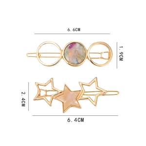 Fermagli per capelli geometrici dorati con cerchi e stelle in texture marmo