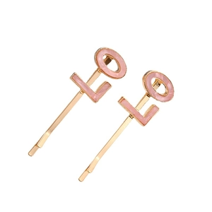 Golden alloy bobby pins with pink LOVE lettering and acetate detail for women