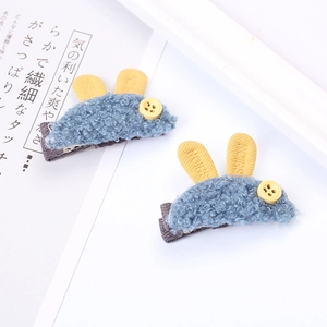 Barrette à cheveux oreilles de lapin en peluche bleue avec détail bouton jaune pour fille