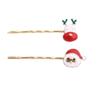 Christmas hair clips set featuring Santa Claus and red-nosed reindeer in gold metal