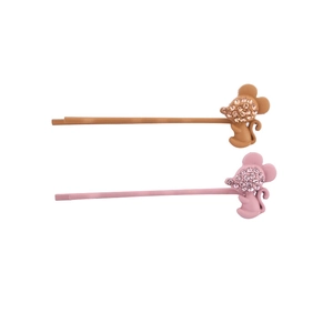 Barrettes à cheveux animaux avec strass en marron et rose sur fond blanc pur