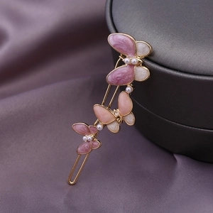 Eleganter goldener Schmetterling-Haarclip mit Emaille-Flügeln und kleinen Perlen
