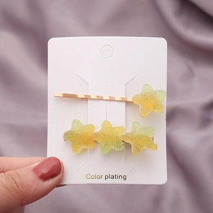 Barrettes à cheveux japonaises avec étoiles dégradées jaune-vert et fini mat