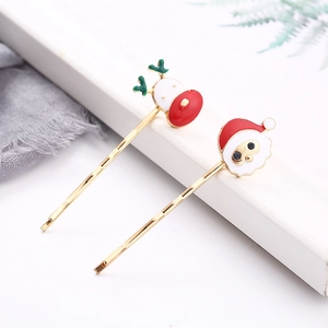 Christmas hair clips set with Santa and reindeer motifs in a gold finish alloy