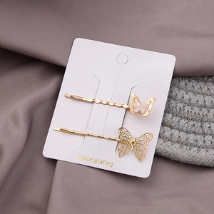 Japanese style minimalist butterfly hair clip set with pink shell and hollow gold finish
