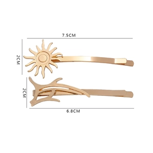 Detailed size specifications for gold sun and cloud shaped alloy hair clips with dimensions