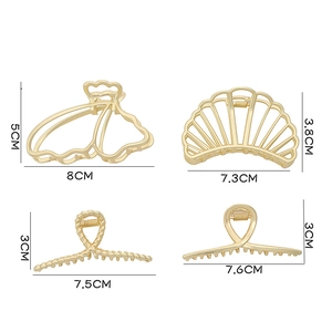 Comparaison détaillée des tailles de quatre pinces à cheveux dorées élégantes