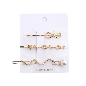 Detailliertes 3er-Set goldene Haarklammern mit Strasssteinen und eleganten Perlen