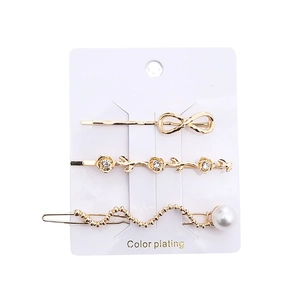 Dreiteiliges goldenes Haarspangen-Set mit Infinity-Design Perlen und Kristallen