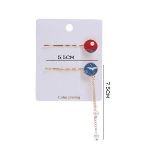 Detail of Chinese style hairpins with crane motif and elegant metal tassels