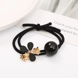 Élastique à cheveux fleur de camélia noir élégant avec strass sur bande élastique