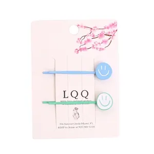Lot de barrettes mignonnes bleu et vert menthe avec smileys sur carte florale