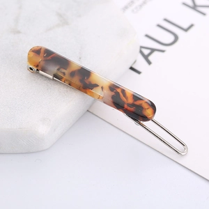 Classic tortoiseshell pattern rectangular hair clip with polished silver metal base for women