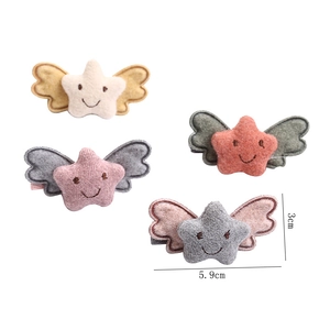 Set of four plush angel wing star hair clips in multiple colors with cute embroidery