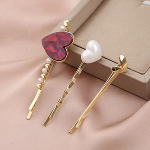 Three-piece heart hair clip set with red pearls, white and gold minimalist clips