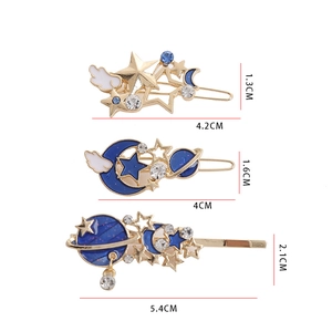Set di tre fermagli per capelli dorati con smalto blu a tema cielo stellato e luna