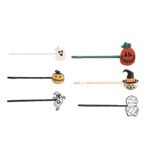 Detail view of 6-piece Halloween hair clip set including ghost, pumpkin, and cat motifs