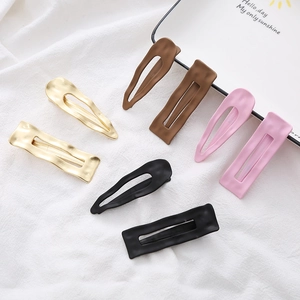 Matte finish hair clips in drop and rectangle shapes with wavy texture in multiple colors