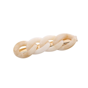 Minimalistische Haarspange aus Acryl mit Marmormuster und goldener Metallbasis
