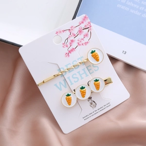 Ensemble de barrettes dorées carotte mignonne avec motifs orange sur soie rose