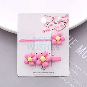 Pink floral hair clips set with bobby pin and duckbill clip on decorative card