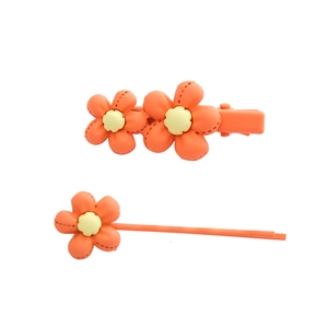Vibrant orange floral hair clip set with matte resin flower petals and cute stitch details