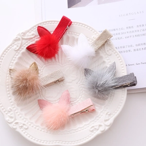 Plush bunny ear hair clips set in five colors including red, white and pink for girls