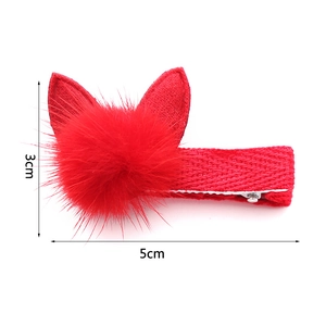 Detail view of red plush bunny ear hair clip with dimensions 5cm length and 3cm height