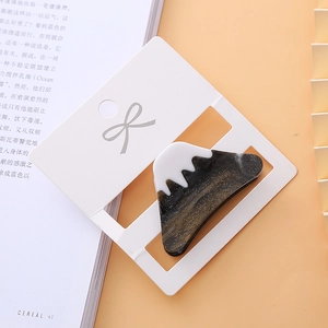 Detailed view of Mt. Fuji acetate hair claw clip with silver glitter and white snow top finish