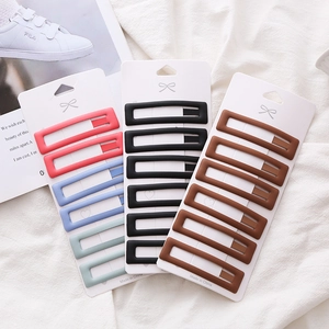 Matte finish rectangular BB hair clips set in various colors on a display card