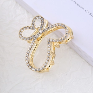 Elegant gold butterfly hair claw clip with sparkling rhinestones for high ponytails