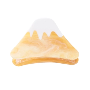 Detailed close-up of Mount Fuji inspired acetate hair claw clip with amber marble texture