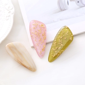 Three-piece Korean marble pattern hair clips with gold foil inlay in neutral tones