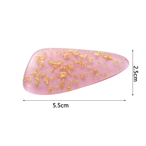 Pink resin hair clip with gold foil flakes, showing dimensions 5.5cm by 2.5cm