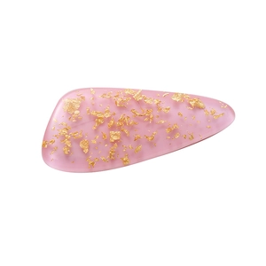 Pink marble texture hair clip with gold foil flakes in a chic drop-shaped resin design